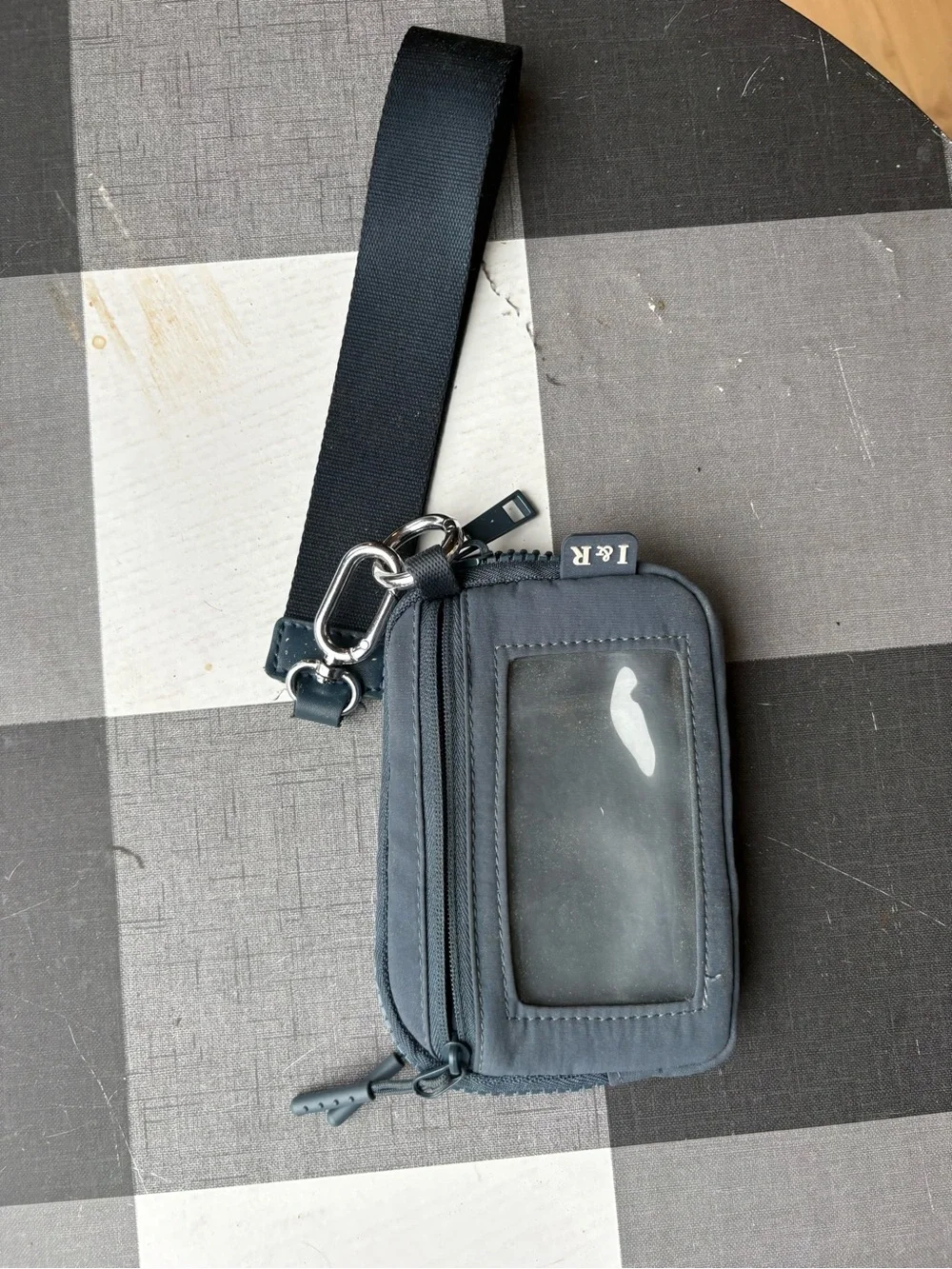 Black Wrist Phone Pouch with Clear ID Window and Clip & Wristlet strap.